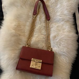 Beautiful red handbag with gold chain!